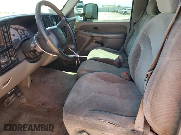 1999 GMC Sierra 1500 SLE z VIN 2GTEK19T8X1512607, wystawiony jako Copart lot #58053205 z przebiegiem 170 792 mil mil oraz Szkoda całkowita • Salvage title. Historia ofert i sprzedaży dostępna na DreamBid. Obrazek 7.