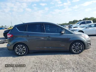 2017 Ford C-Max Energi Titanium with VIN 1FADP5FU9HL117693, listed as a IAAI auction lot 42059763 with 86,827 mi miles. Bid and sale history available at carsss.com. Image 14.