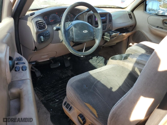 1999 Ford F-150 Work Series with VIN 1FTRX18WXXNA56977, listed as a Copart auction lot 77179044 with 0 mi miles and Salvage Title. Bid and sale history available at carsss.com. Image 8.