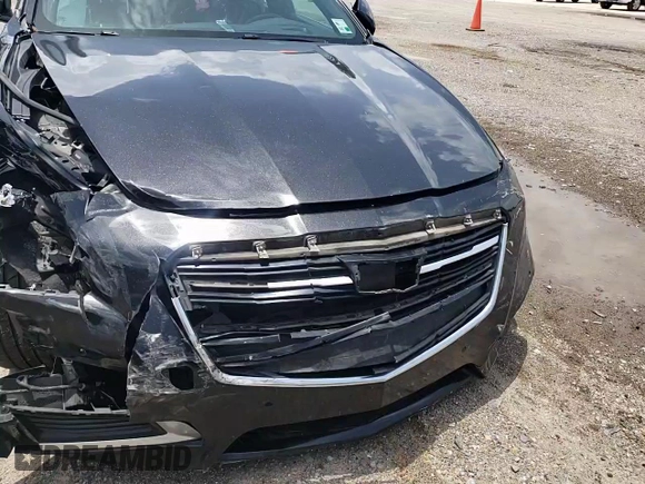 2015 Cadillac CTS Premium AWD with VIN 1G6AZ5S38F0116993, listed as a Copart auction lot 63087095 with 100,533 mi miles and Salvage title. Bid and sale history available at DreamBid. Image 13.