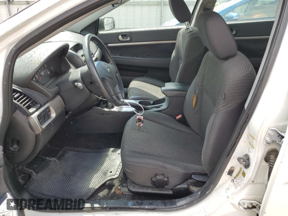 2012 Mitsubishi Galant FE z VIN 4A32B2FF1CE019686, wystawiony jako Copart lot #55268385 z przebiegiem 194 351 mil mil oraz Szkoda całkowita • Salvage title. Historia ofert i sprzedaży dostępna na DreamBid. Obrazek 7.