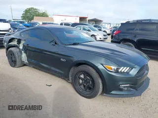 2016 Ford Mustang GT with VIN 1FA6P8CF1G5265677, listed as a IAAI auction lot 41931024 with 74,061 mi miles. Bid and sale history available at carsss.com. Image 1.
