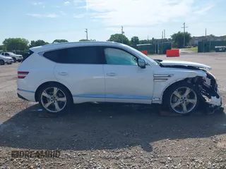 2022 Genesis GV80 with VIN KMUHBDSB2NU079042, listed as a IAAI auction lot 42695020 with 18,719 mi miles and . Bid and sale history available at DreamBid. Image 14.