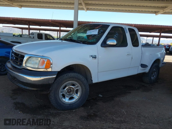 1997 Ford F-150 z VIN 1FTDX08W4VKC89238, wystawiony jako IAAI lot #42132010 z przebiegiem 204 386 mil mil oraz . Historia ofert i sprzedaży dostępna na DreamBid. Obrazek 2.