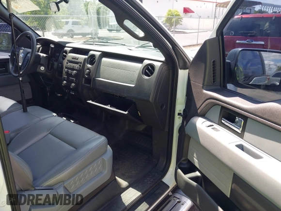 2013 Ford F-150 XL with VIN 1FTFW1EF5DKF08289, listed as a IAAI auction lot 42150706 with 169,459 mi miles and . Bid and sale history available at DreamBid. Image 5.