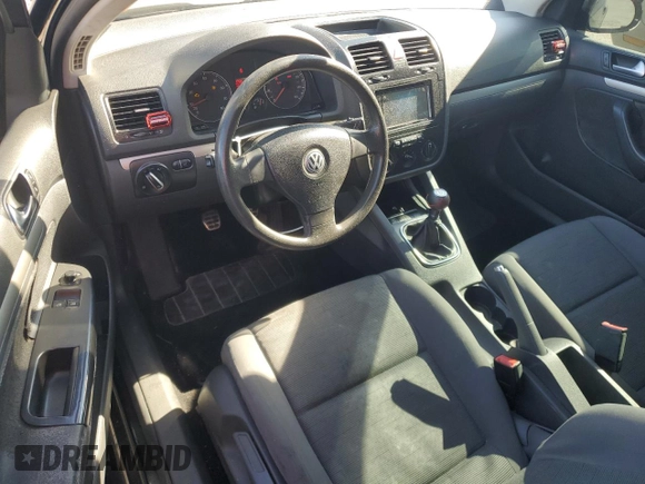 2009 Volkswagen Rabbit S with VIN WVWAB71K59W104212, listed as a Copart auction lot 46642025 with 149,001 mi miles and Salvage title. Bid and sale history available at DreamBid. Image 8.