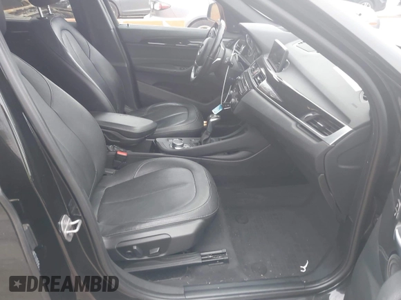 2017 BMW X1 xDrive28i with VIN WBXHT3C31H5F72958, listed as a IAAI auction lot 41782257 with 134,829 mi miles. Bid and sale history available at carsss.com. Image 5.