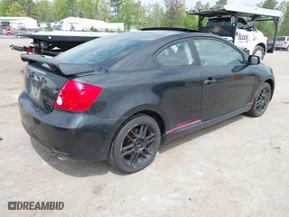 2007 Scion tC Spec with VIN JTKDE177270189720, listed as a IAAI auction lot 42091253 with 123,521 mi miles. Bid and sale history available at carsss.com. Image 4.