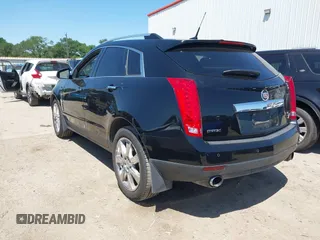 2011 Cadillac SRX Premium Collection z VIN 3GYFNCEY5BS597566, wystawiony jako IAAI lot #41983784 z przebiegiem 102 989 mil mil oraz . Historia ofert i sprzedaży dostępna na DreamBid. Obrazek 3.