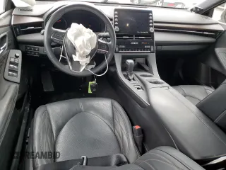 2021 Toyota Avalon z VIN 4T1NB1BB0MU001552, wystawiony jako Copart lot #56735505 z przebiegiem 43 767 mil mil oraz Szkoda całkowita • Salvage title. Historia ofert i sprzedaży dostępna na DreamBid. Obrazek 8.