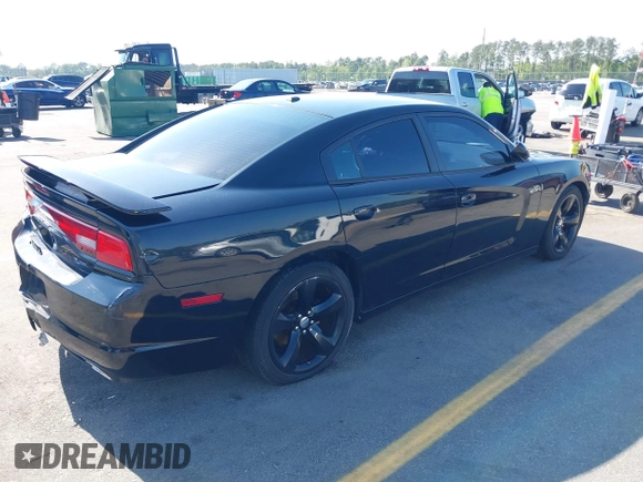 2012 Dodge Charger SXT with VIN 2C3CDXHG2CH258844, listed as a IAAI auction lot 42025908 with 214,529 mi miles. Bid and sale history available at carsss.com. Image 4.