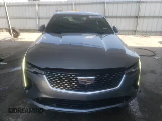 2023 Cadillac CT4 Premium Luxury z VIN 1G6DF5RK1P0131422, wystawiony jako Copart lot #65443314 z przebiegiem 37 385 mil mil oraz Czysty tytuł • Clean title. Historia ofert i sprzedaży dostępna na DreamBid. Obrazek 5.