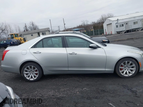 2014 Cadillac CTS Luxury AWD z VIN 1G6AX5SX3E0194895, wystawiony jako IAAI lot #41741824 z przebiegiem 197 042 mil mil oraz . Historia ofert i sprzedaży dostępna na DreamBid. Obrazek 13.