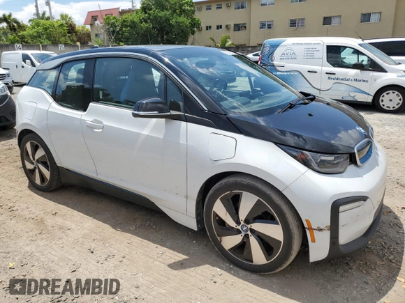 2018 BMW i3 with VIN WBY7Z4C54JVD96989, listed as a Copart auction lot 52804063 with 50,865 mi miles. Bid and sale history available at carsss.com. Image 4.