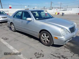 2002 Mercedes-Benz E-Class with VIN WDBJF65J82B447785, listed as a IAAI auction lot 41997147 with 74,433 mi miles. Bid and sale history available at carsss.com. Image 1.