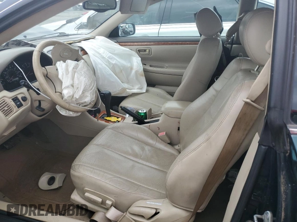 2002 Toyota Solara SE with VIN 2T1CF28P72C596631, listed as a Copart auction lot 66685114 with Not Provided miles and Salvage Title. Bid and sale history available at DreamBid. Image 7.