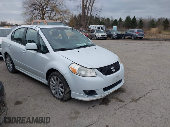 2012 Suzuki SX4 with VIN JS2YC5A52C6300339, listed as a IAAI auction lot 41829263 with 63,717 mi miles and . Bid and sale history available at DreamBid. Image 1.