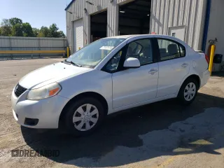 2012 Suzuki SX4 LE with VIN JS2YC5A35C6303637, listed as a Copart auction lot 71122474 with 169,761 mi miles and Salvage Title. Bid and sale history available at carsss.com. Image 1.