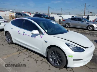 2020 Tesla Model 3 Standard Range Plus with VIN 5YJ3E1EA4LF805205, listed as a IAAI auction lot 41850744 with Not Provided miles. Bid and sale history available at carsss.com. Image 1.