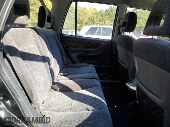 1999 Honda CR-V LX with VIN JHLRD2847XC021888, listed as a Copart auction lot 76556164 with 285,517 mi miles and Salvage Title. Bid and sale history available at carsss.com. Image 11.