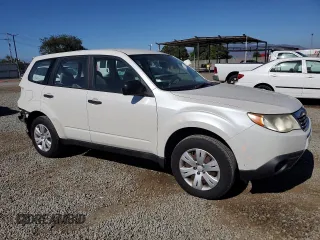 2010 Subaru Forester X with VIN JF2SH6AC0AH743775, listed as a Copart auction lot 60884835 with 127,481 mi miles and Salvage title. Bid and sale history available at DreamBid. Image 4.