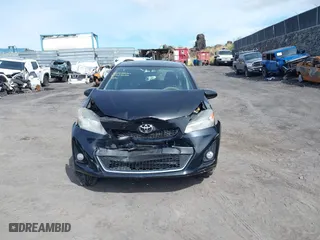 2012 Toyota Yaris L with VIN JTDKTUD35CD529596, listed as a IAAI auction lot 41439354 with 87,493 mi miles. Bid and sale history available at carsss.com. Image 12.