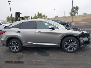 2022 Lexus RX 450h with VIN 2T2HGMDA7NC072735, listed as a IAAI auction lot 42356852 with 62,835 mi miles and . Bid and sale history available at DreamBid. Image 14.