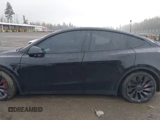 2021 Tesla Model Y Performance z VIN 5YJYGDEF2MF215938, wystawiony jako IAAI lot #41338287 z przebiegiem 63 925 mil mil oraz . Historia ofert i sprzedaży dostępna na DreamBid. Obrazek 13.