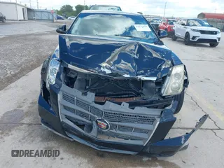 2008 Cadillac CTS RWD z VIN 1G6DJ577080174096, wystawiony jako IAAI lot #42237070 z przebiegiem 139 776 mil mil oraz . Historia ofert i sprzedaży dostępna na DreamBid. Obrazek 12.