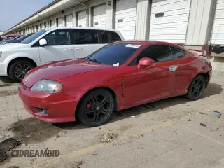 2006 Hyundai Tiburon GT z VIN KMHHN65F86U190230, wystawiony jako Copart lot #47736175 z przebiegiem 156 991 mil mil oraz Nie do naprawy. Historia ofert i sprzedaży dostępna na DreamBid. Obrazek 1.