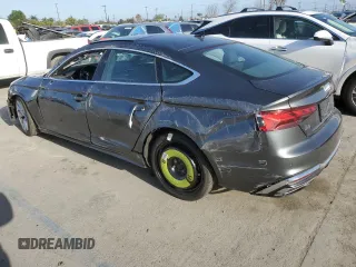 2024 Audi A5 Sportback S line Premium Plus z VIN WAUFACF53RA071001, wystawiony jako Copart lot #60230745 z przebiegiem 22 911 mil mil oraz Szkoda całkowita • Salvage title. Historia ofert i sprzedaży dostępna na DreamBid. Obrazek 2.