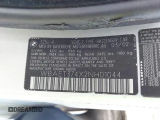 2002 BMW 3 Series 325i with VIN WBAET374X2NH01044, listed as a IAAI auction lot 42021446 with 257,712 mi miles. Bid and sale history available at carsss.com. Image 9.