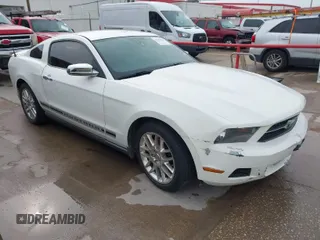 2012 Ford Mustang V6 Premium with VIN 1ZVBP8AM7C5237562, listed as a IAAI auction lot 41842246 with 178,867 mi miles. Bid and sale history available at carsss.com. Image 1.