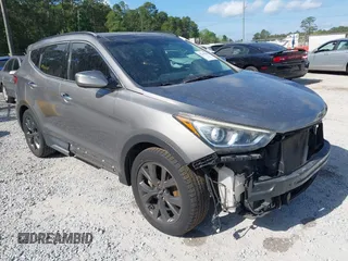 2018 Hyundai Santa Fe Ultimate z VIN 5XYZW4LA5JG548590, wystawiony jako IAAI lot #42146019 z przebiegiem 72 304 mil mil oraz . Historia ofert i sprzedaży dostępna na DreamBid. Obrazek 1.
