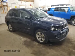 2014 Jeep Compass Sport with VIN 1C4NJDBB0ED598518, listed as a Copart auction lot 55072665 with 128,141 mi miles and Salvage Title. Bid and sale history available at carsss.com. Image 4.