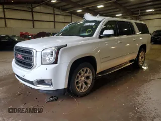 2015 GMC Yukon XL SLE with VIN 1GKS2GKC4FR738668, listed as a Copart auction lot 82119264 with 191,093 mi miles and Clean Title. Bid and sale history available at carsss.com. Image 1.