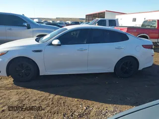 2019 Kia Optima LX with VIN 5XXGT4L39KG280991, listed as a IAAI auction lot 41639322 with 107,039 mi miles. Bid and sale history available at carsss.com. Image 14.
