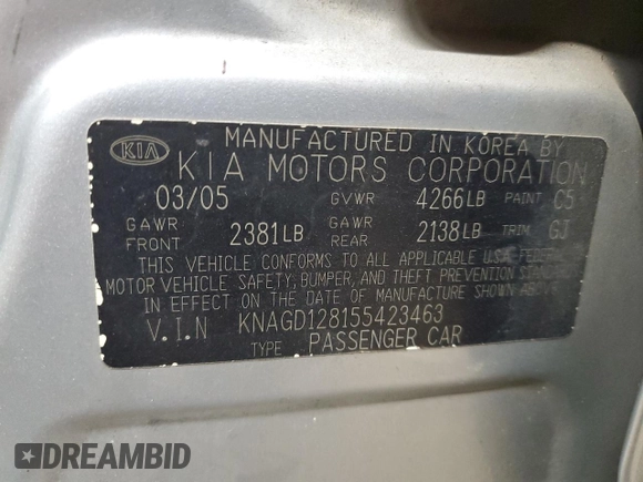 2005 Kia Optima LX z VIN KNAGD128155423463, wystawiony jako Copart lot #87441284 z przebiegiem 143 193 mil mil oraz Szkoda całkowita • Salvage title. Historia ofert i sprzedaży dostępna na DreamBid. Obrazek 14.