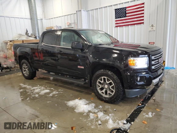 2015 GMC Canyon 4WD SLE with VIN 1GTG6BE35F1119242, listed as a Copart auction lot 87260474 with 184,286 mi miles and Clean Title. Bid and sale history available at carsss.com. Image 4.