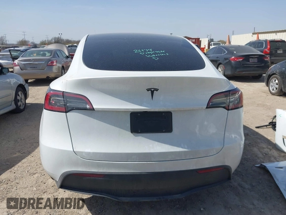2024 Tesla Model Y with VIN 7SAYGDEDXRA300743, listed as a IAAI auction lot 41690374 with 12,446 mi miles and . Bid and sale history available at DreamBid. Image 17.