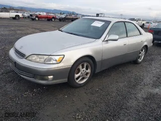 2000 Lexus ES 300 with VIN JT8BF28G9Y5088953, listed as a IAAI auction lot 41206922 with 254,063 mi miles. Bid and sale history available at carsss.com. Image 2.
