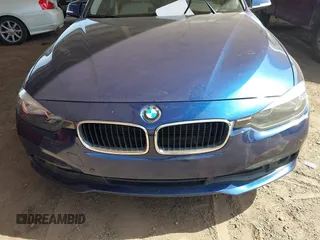 2016 BMW 3 Series 320i with VIN WBA8A9C57GK616589, listed as a IAAI auction lot 41938917 with 77,264 mi miles. Bid and sale history available at carsss.com. Image 6.