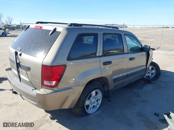2005 Jeep Grand Cherokee Laredo with VIN 1J4GR48K85C540116, listed as a IAAI auction lot 41816065 with 137,388 mi miles. Bid and sale history available at carsss.com. Image 4.