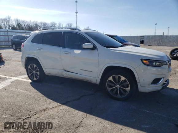 2019 Jeep Cherokee Overland with VIN 1C4PJMJN3KD173830, listed as a Copart auction lot 87229794 with 82,433 mi miles and Salvage title. Bid and sale history available at DreamBid. Image 4.