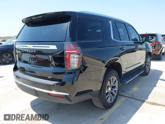 2024 Chevrolet Tahoe LT with VIN 1GNSCNKD7RR374098, listed as a IAAI auction lot 41849542 with 7,227 mi miles and . Bid and sale history available at DreamBid. Image 4.