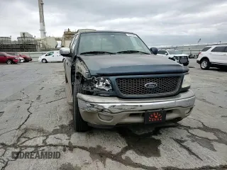 2001 Ford F-150 XLT with VIN 1FTRW07LX1KA18940, listed as a Copart auction lot 50723495 with 133,686 mi miles and Salvage title. Bid and sale history available at DreamBid. Image 11.