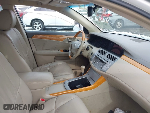 2007 Toyota Avalon XL with VIN 4T1BK36B87U235659, listed as a IAAI auction lot 41311087 with 74,760 mi miles. Bid and sale history available at carsss.com. Image 5.