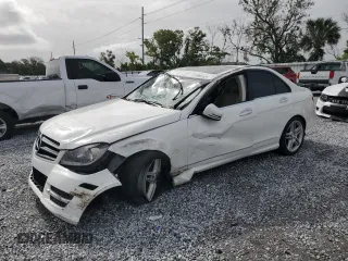 2014 Mercedes-Benz C 250 Sport with VIN WDDGF4HB4EG231661, listed as a Copart auction lot 59657335 with 83,731 mi miles and Salvage title. Bid and sale history available at DreamBid. Image 1.