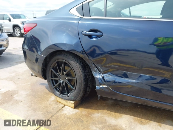 2015 Mazda 6 i Sport with VIN JM1GJ1U52F1201571, listed as a IAAI auction lot 42096344 with 88,290 mi miles and . Bid and sale history available at DreamBid. Image 6.