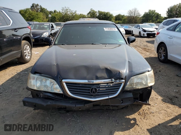 2002 Acura RL with VIN JH4KA96512C013028, listed as a Copart auction lot 71436914 with 142,527 mi miles and Salvage Title. Bid and sale history available at carsss.com. Image 5.